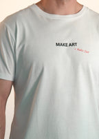 White t-shirt with 'MAKE ART + Make Out' text on a plain background